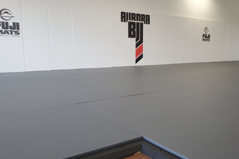 a picture of the mat space at the academy